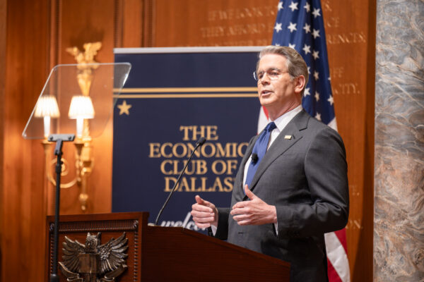 Man speaking at podium